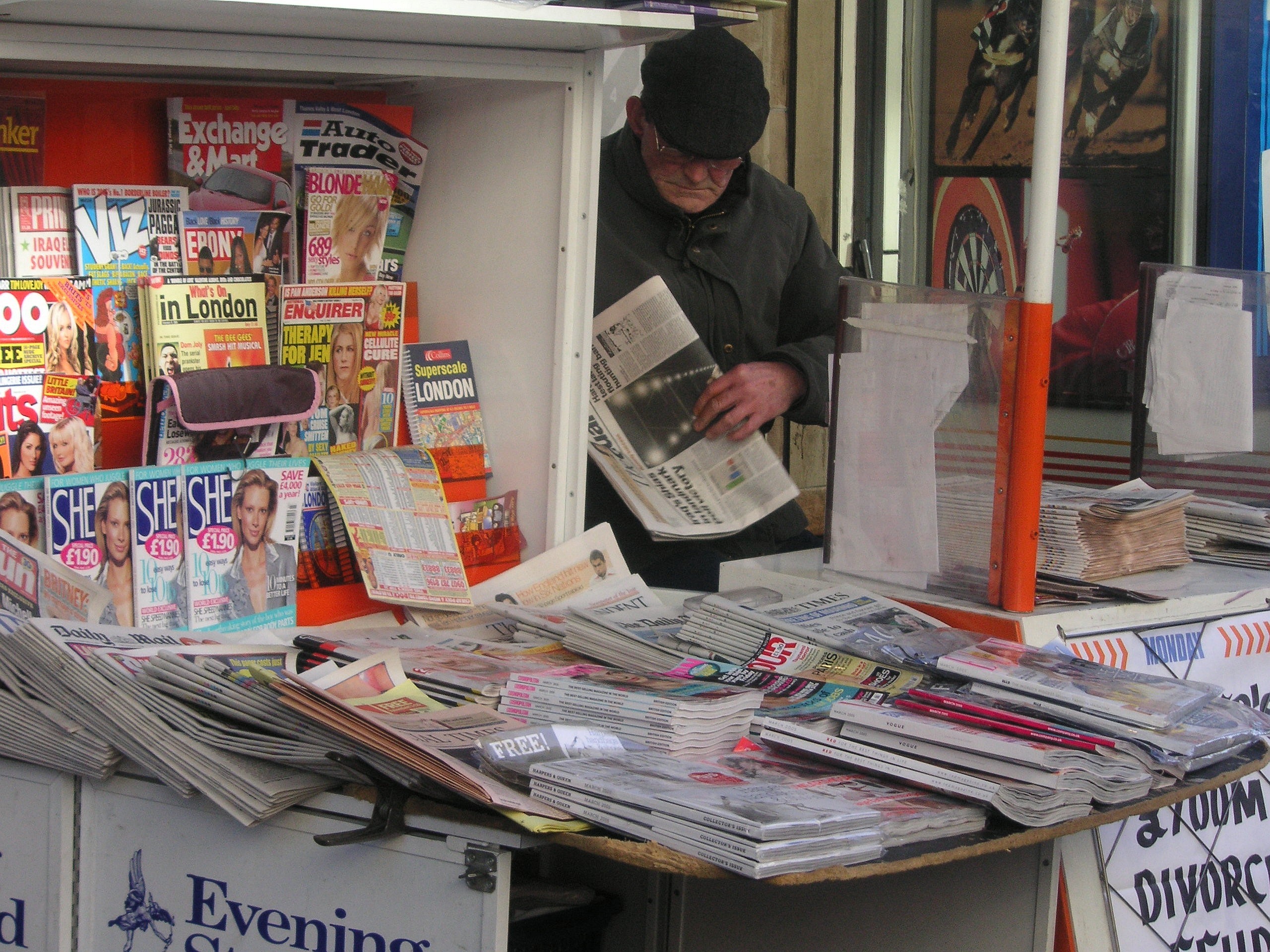 A newsstand, with multiple legacy news organs for sale