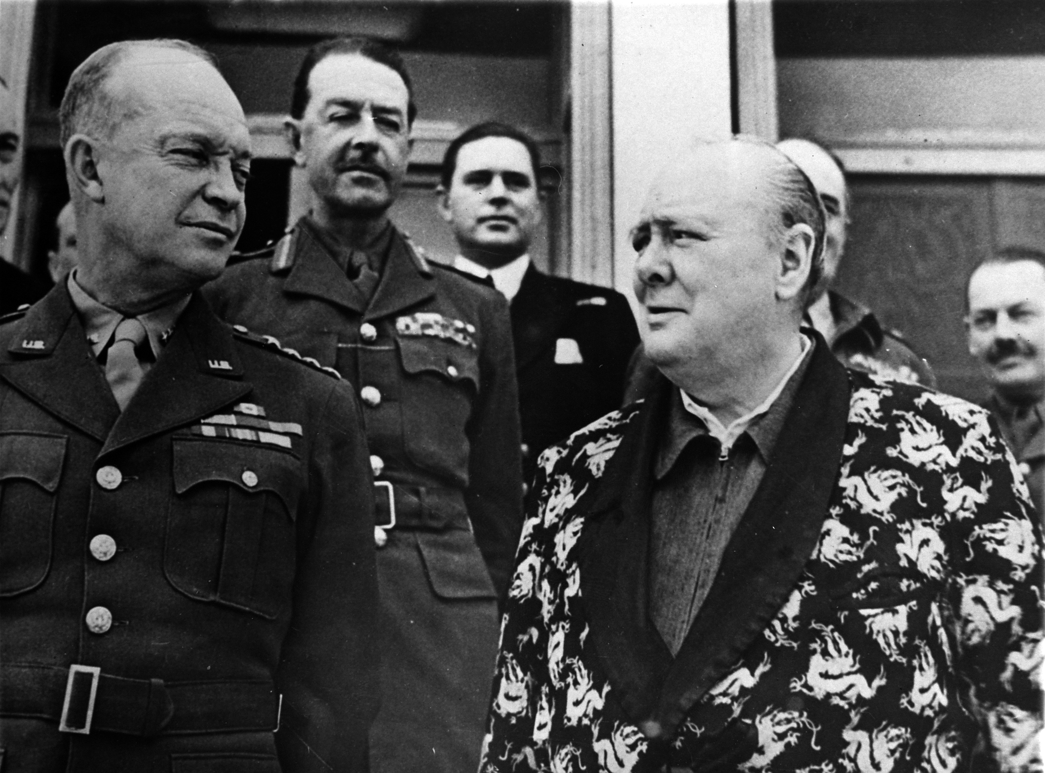 Generals Eisenhower and Alexander, and Prime Minister Sir Winston Churchill