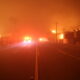 Looking down a street during the Palisades Fire