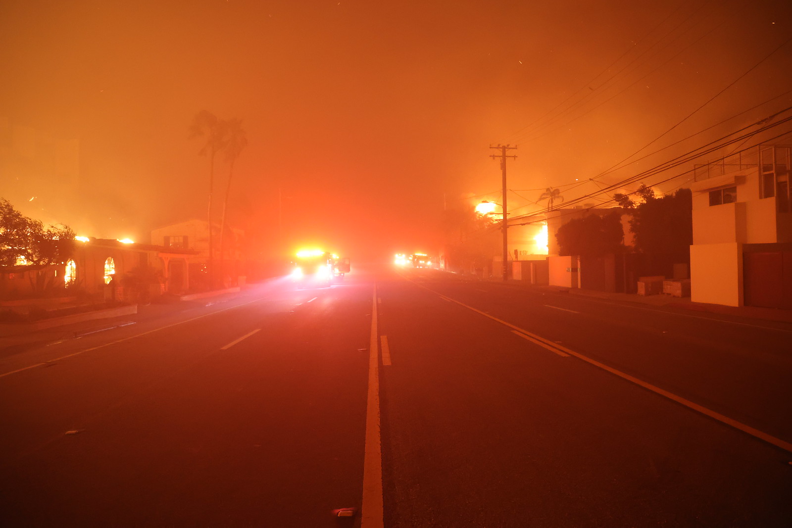 Looking down a street during the Palisades Fire