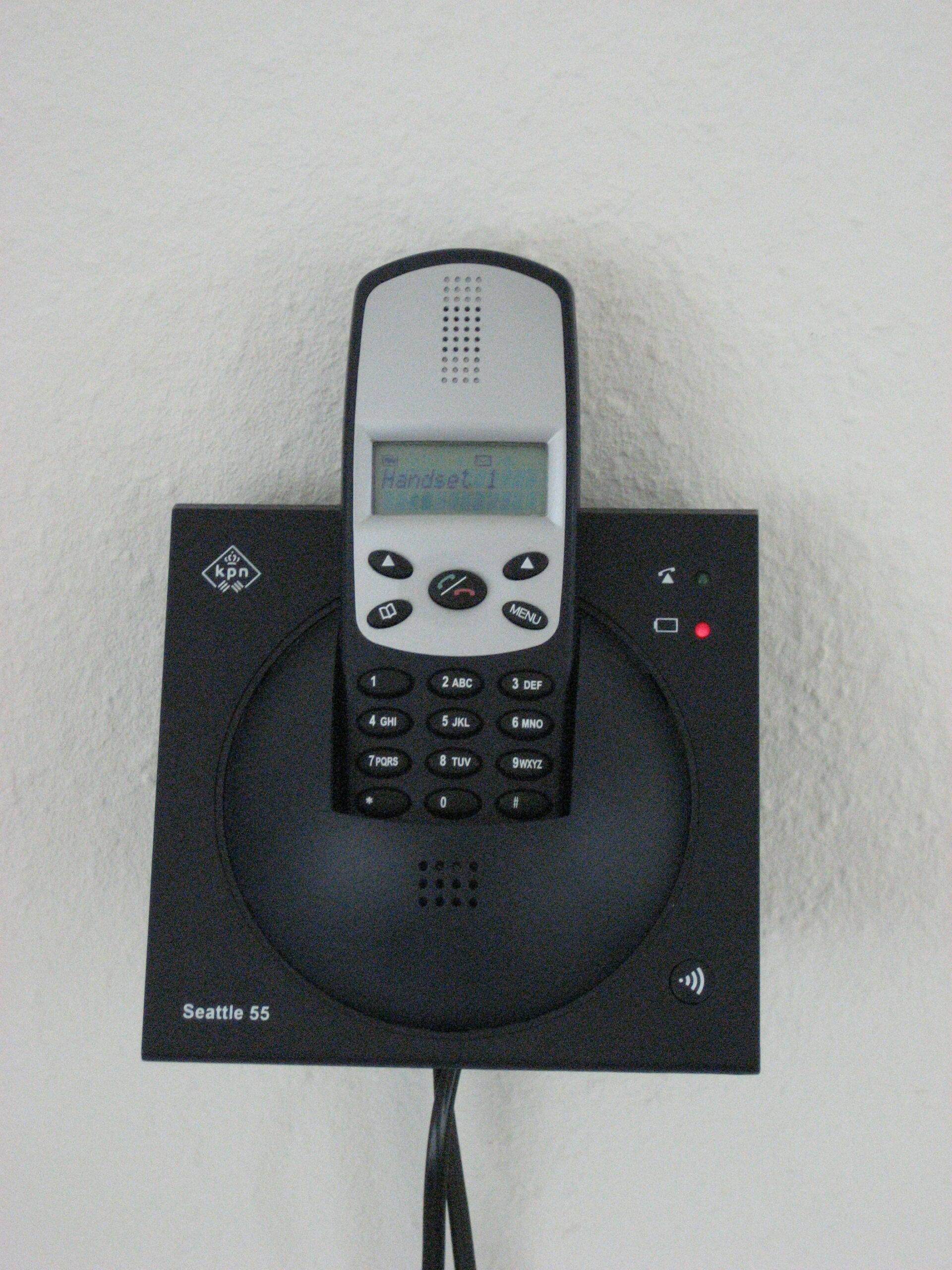 A modern telephone base and handset